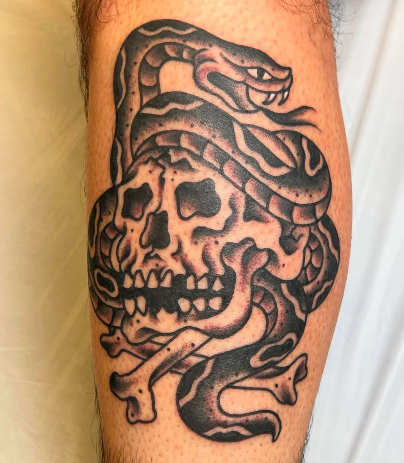 Black and gray skull tattoo